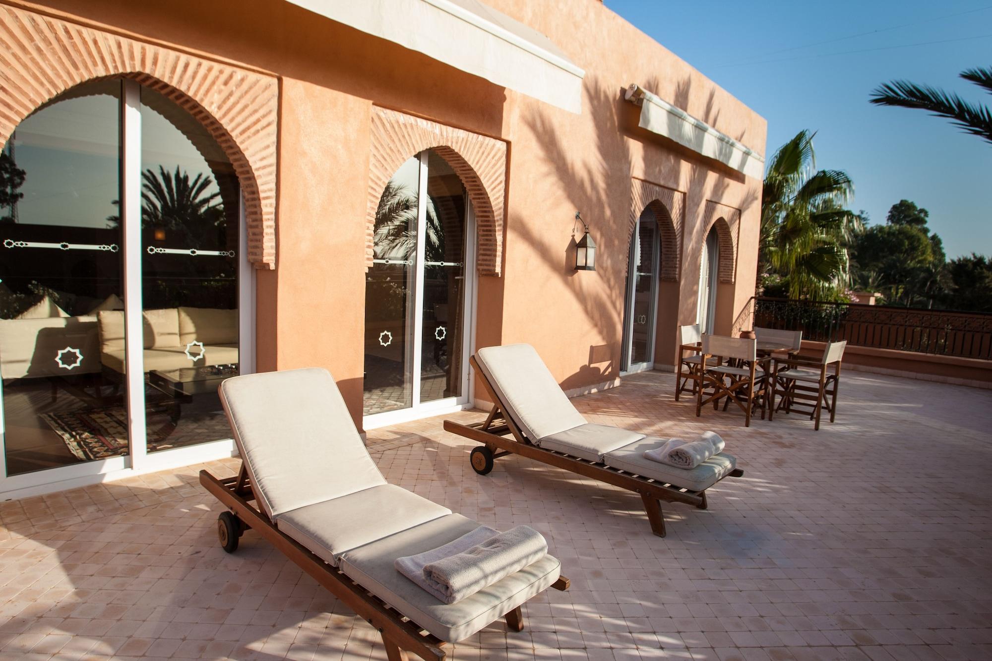 Tikida Golf Palace - Relais&Châteaux Agadir Exterior foto The hotel's rooftop