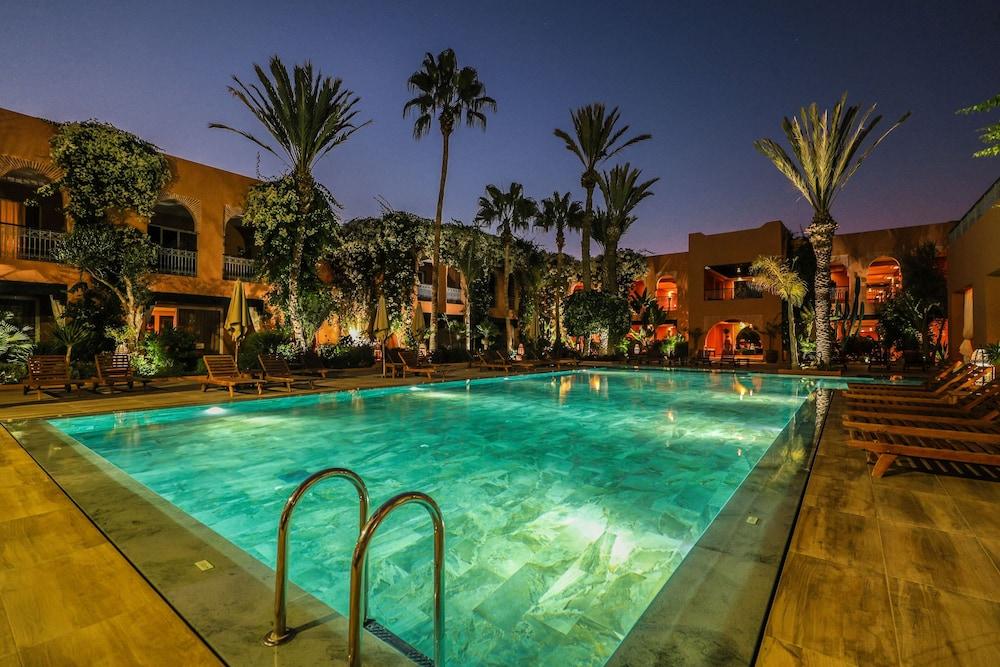 Tikida Golf Palace - Relais&Châteaux Agadir Exterior foto The swimming pool at the hotel